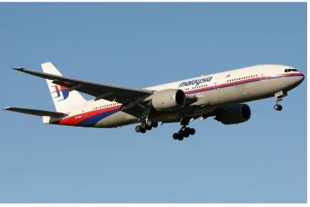 A Malaysia Airlines passenger jet in flight